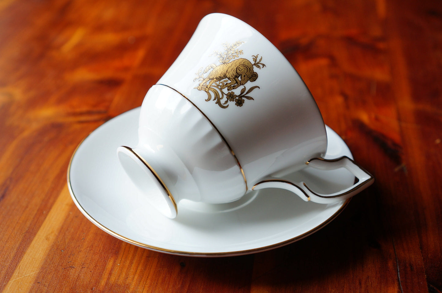 Royal Tuscan Aries pattern teacup and saucer, made in England. fine bone china
